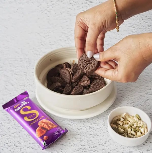 Frozen Silk Chocolate Bites with Nuts and Oreo Crumble - Crush 10–12 Oreo cookies into fine crumbs