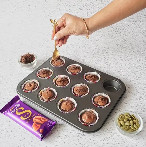 Frozen Silk Chocolate Bites with Nuts and Oreo Crumble - Drizzle additional melted chocolate
