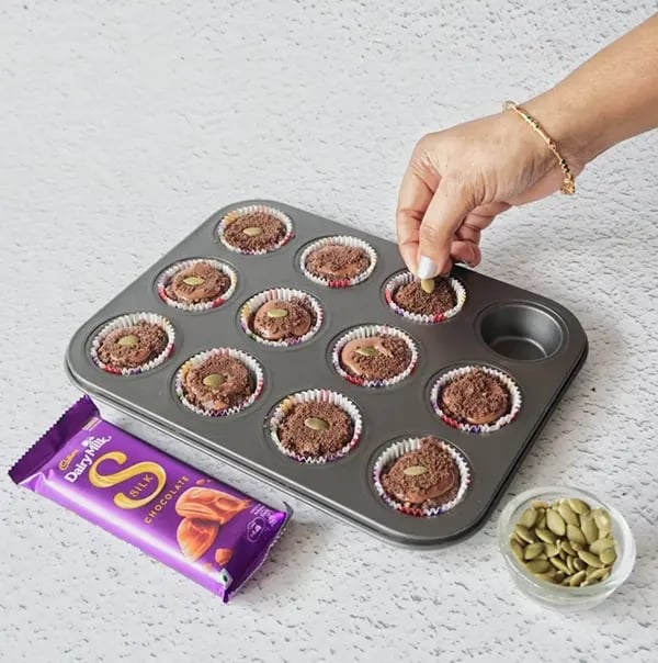 Frozen Silk Chocolate Bites with Nuts and Oreo Crumble - Top with more chopped nuts for added crunch