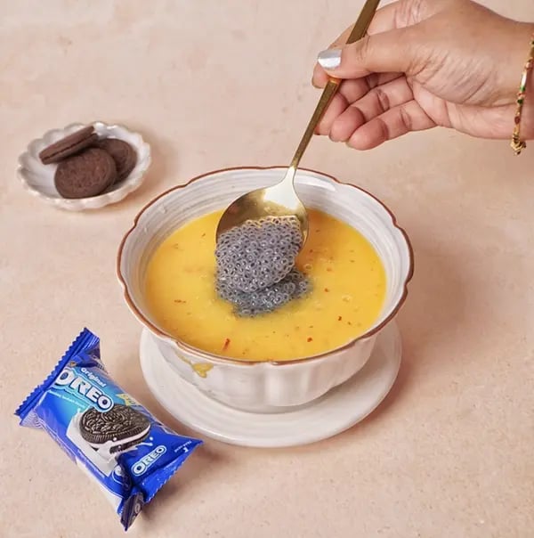 Fruit Popsicles with Oreo Crust-Add the soaked basil