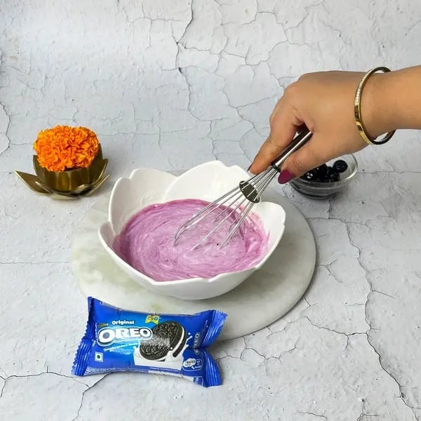 Ganpati Special: Oreo Blueberry Shrikhand Recipe To Try - Folding Blueberry Puree