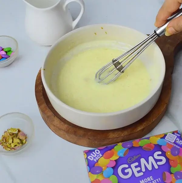 Gems Topping Pistachio Infused Chocolate Cupcakes - Keep mixing