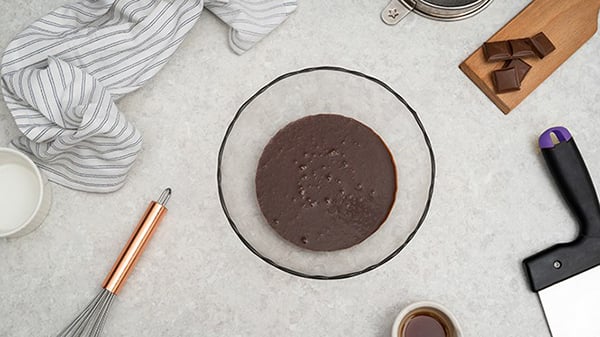 Gooey Choco Lava Cake Recipe - Greasing Muffin Cups