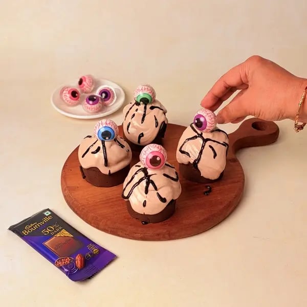 Gummy Eyeball Chocolate Cupcakes With Cadbury Bournville: An Easy Halloween Treat - Placing Gummy Eyeballs
