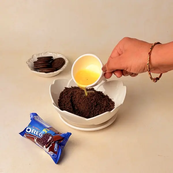 Halloween-Themed Cheesecake - An Oreo-Crusted Black Cocoa Dessert - Crushing Oreo Cookies