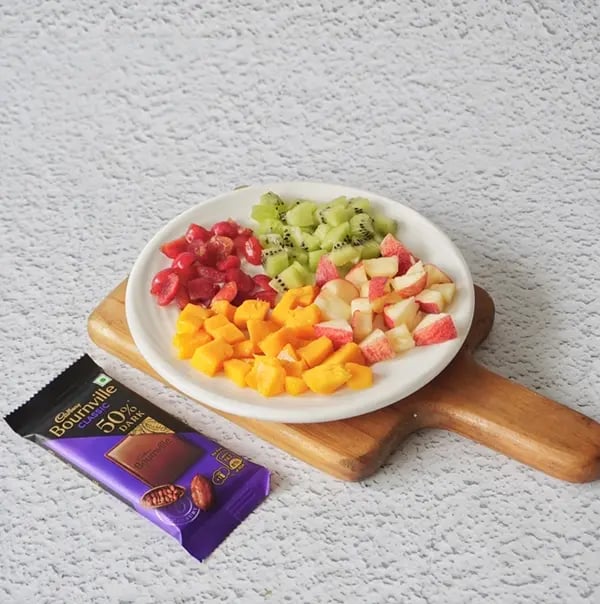 Healthy & Chocolatey Fruit Salad Bars with Bournville Chocolate - Fresh fruits into small to medium-sized pieces