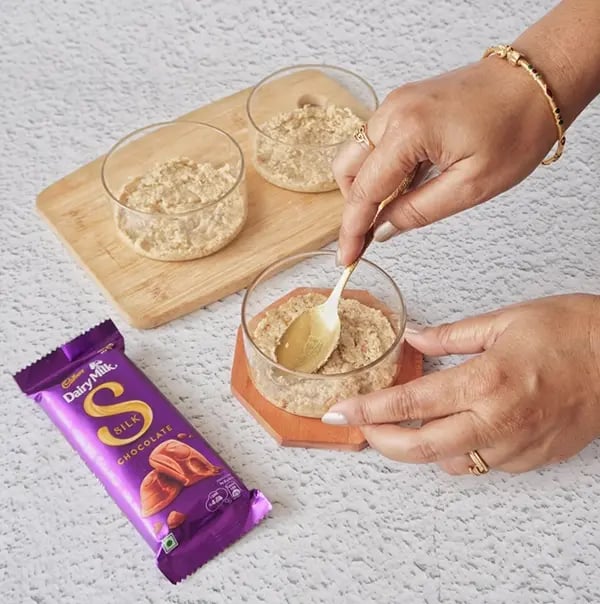 Healthy Cheesecake with Dairy Milk Silk and Mixed Nuts - Spoon 1–2 teaspoons of the mixture into small ramekins