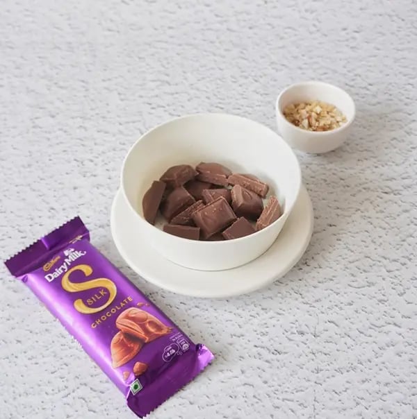 Healthy Cheesecake with Dairy Milk Silk and Mixed Nuts - Break Cadbury Dairy Milk Silk chocolate into pieces