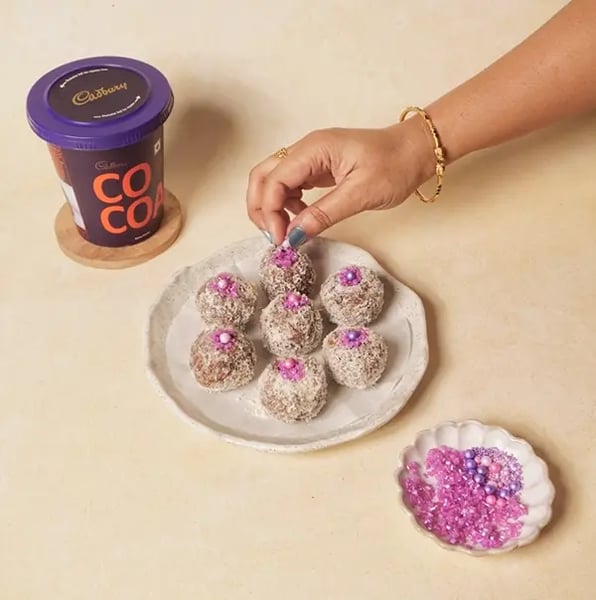 Healthy Choco Coconut Truffles With Banana For Friendship Day Gift Recipe - Arranged Truffles On Plate