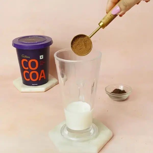 Homemade Chocolate Cocoa Iced Coffee - Pour ¼ cup milk