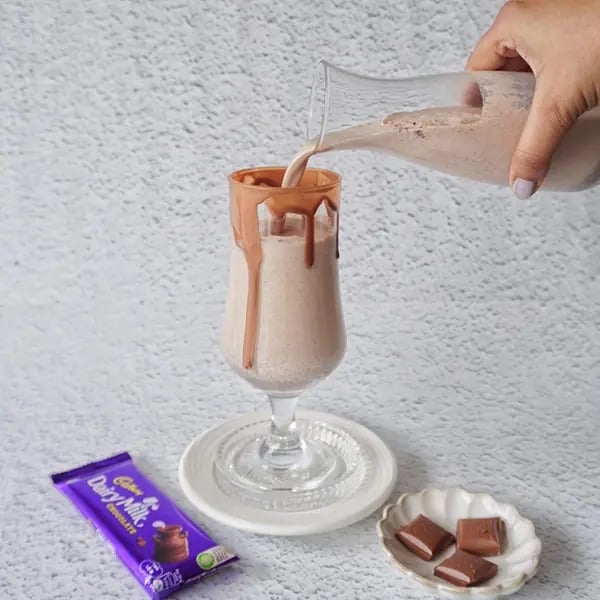 Iced Chocolate Shake with Cadbury Dairy Milk Chocolate - Milkshake into a decorated serving glass