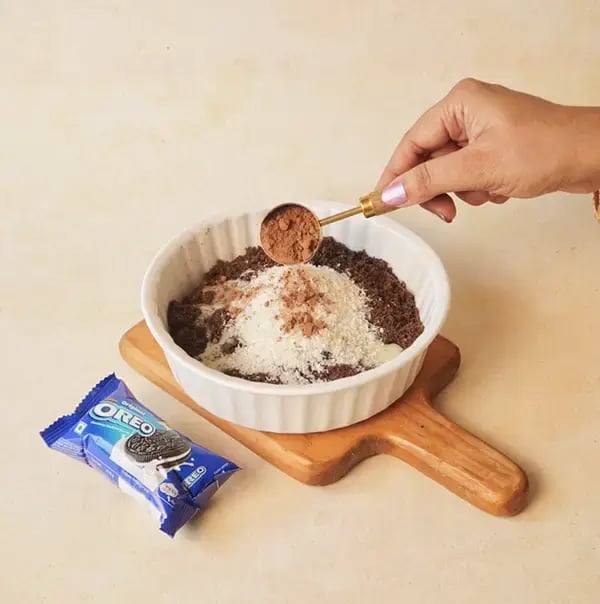 Instant Oreo Chocolate Ladoo For Raksha Bandhan - Stir in cocoa powder