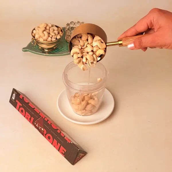 Kaju Barfi Chocolate Bonbons: A Diwali Mithai Fusion For Gifting - Grinding Cashew Nuts