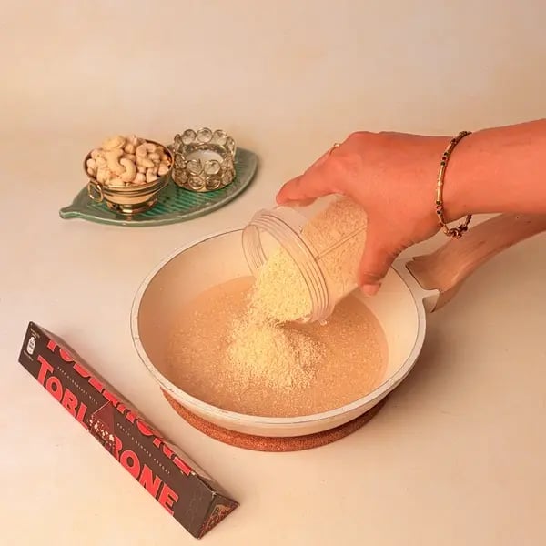 Kaju Barfi Chocolate Bonbons: A Diwali Mithai Fusion For Gifting - Stirring Cashew Mixture