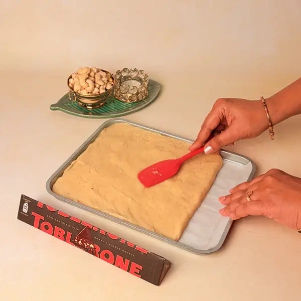 Kaju Barfi Chocolate Bonbons: A Diwali Mithai Fusion For Gifting - Spreading Cashew Mixture