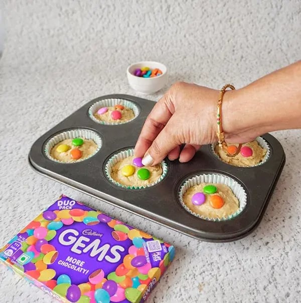 Lemon & Poppy Seeds Muffins with Gems - Gently press a few colorful Cadbury Gems