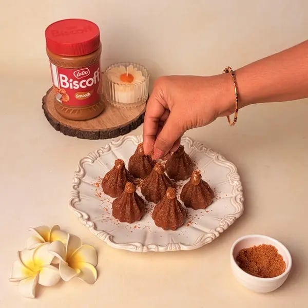 Lotus Biscoff Modak For Ganpati Bappa - Sprinkling Biscoff Crumbles