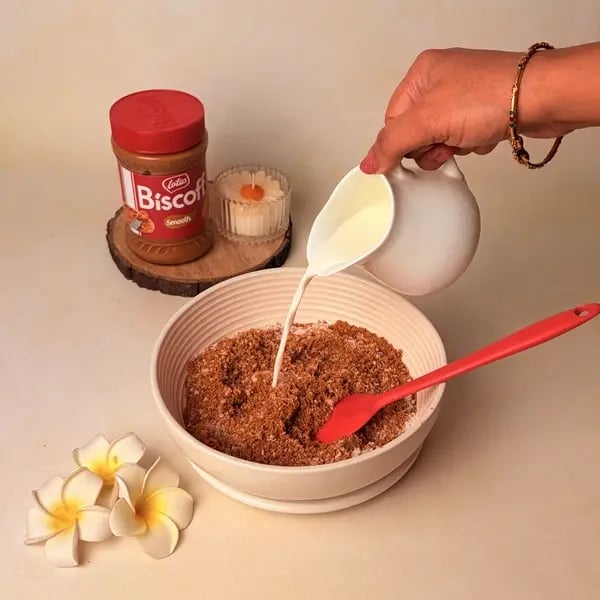 Lotus Biscoff Modak For Ganpati Bappa - Adding Milk To Mixture