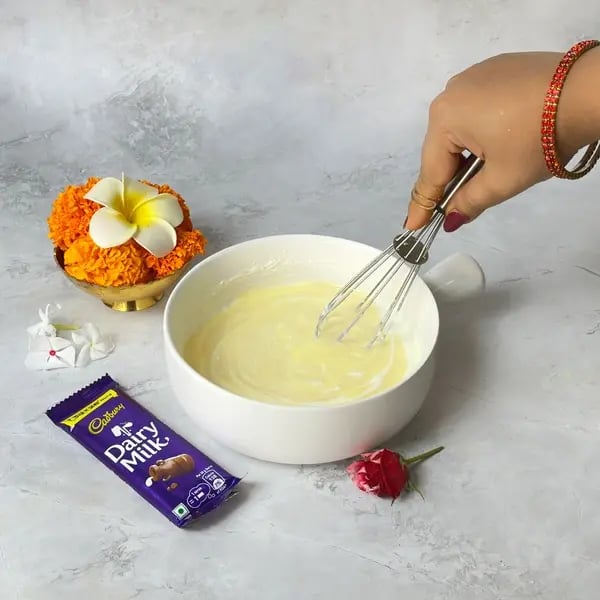 Make This Kesar Elaichi Shrikhand Recipe With Dairy Milk Fusion For Festive Flavors - Mixing Curd Milk