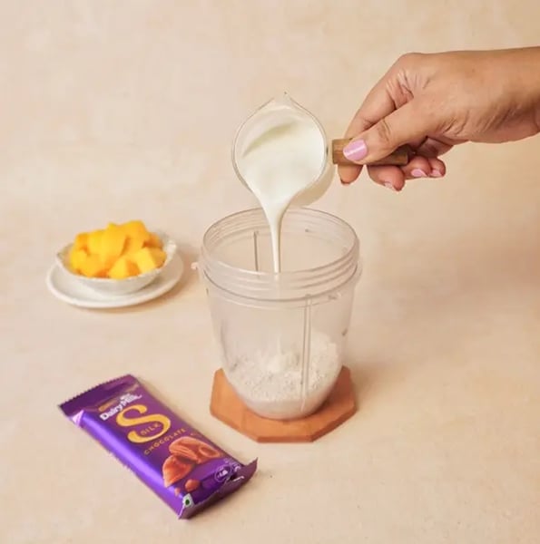 Mango Oats Smoothie With Cadbury Silk Crunch Recipe - Yogurt Mango In Blender