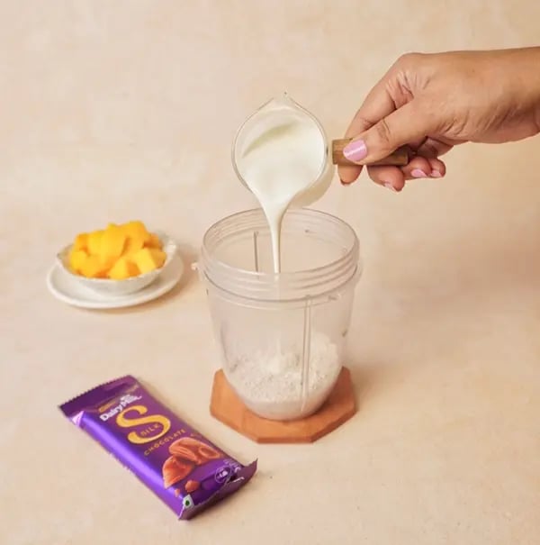 Mango Oats Smoothie with Cadbury Silk Crunch-Incorporate the Greek yogurt
