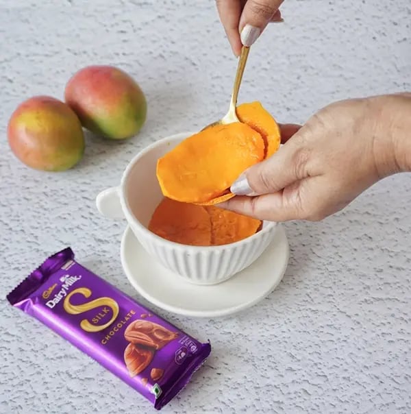 Mango Shrikhand Dessert With Silk Chocolate-Chop mangoes and blend it