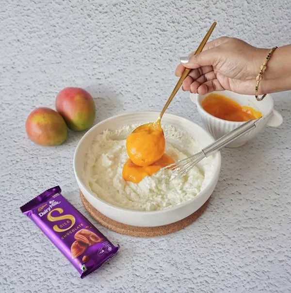 Mango Shrikhand Dessert With Silk Chocolate-Fold in the mango puree