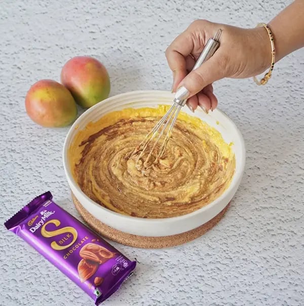Mango Shrikhand Dessert With Silk Chocolate-Mix gently and refrigerate