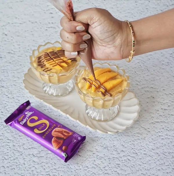 Mango Shrikhand Dessert With Silk Chocolate-Garnish with mango pieces