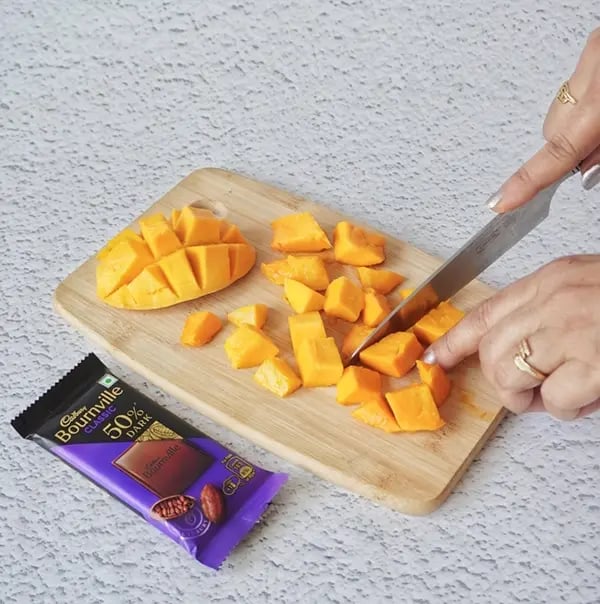 Mango Shrikhand with Bournville Chocolate chips-Chop mangoes into small cubes