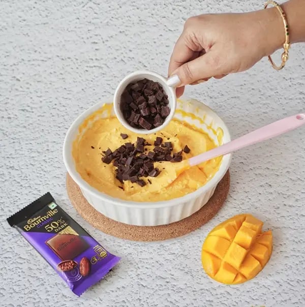 Mango Shrikhand with Bournville Chocolate chips-Add in the chopped Bournville chocolate pieces
