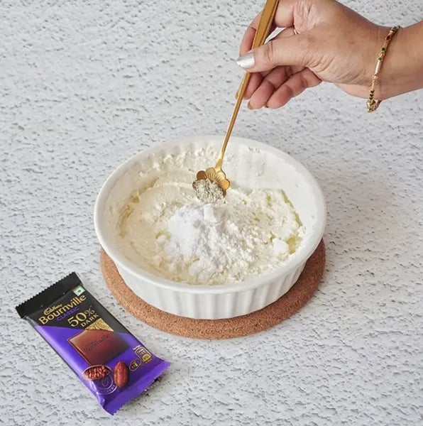 Mango Shrikhand With Bournville Chocolate Chips Recipe - Folding Chocolate Chips