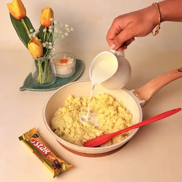 Mawa Kheer Caramel Fudge: A Classic Navratri Dessert Recipe - Pouring Milk Into Mixture