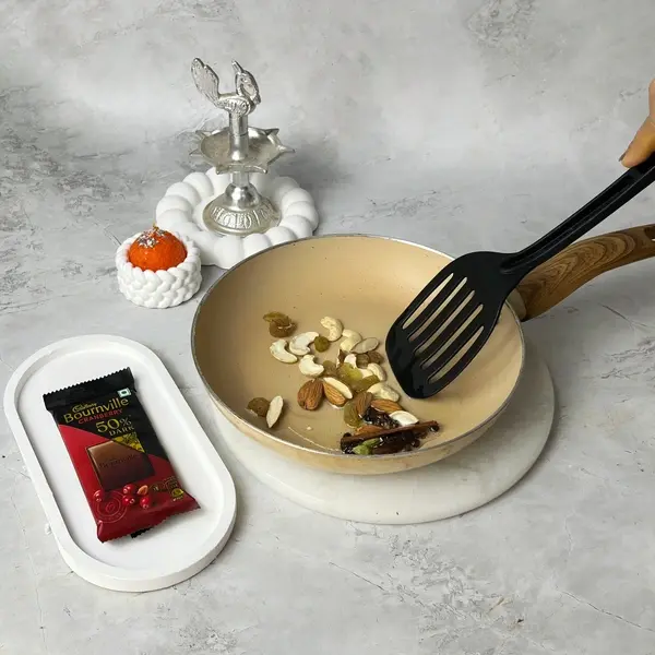 Meethe Chawal Recipe With Bournville And Choco-Gems Crunch For Diwali - Frying Cashews And Almonds