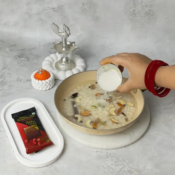 Meethe Chawal Recipe With Bournville And Choco-Gems Crunch For Diwali - Stirring Sugar Mixture