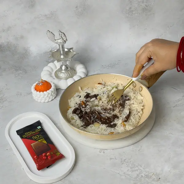 Meethe Chawal Recipe With Bournville And Choco-Gems Crunch For Diwali - Fluffing Rice With Fork