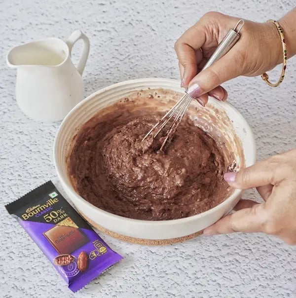 Mini Cream Brownies with Pistachio And Cadbury Bournville - Mix gently to combine well