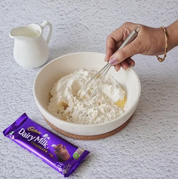 Mini Egg Nest Sugar Cookies with Dairy Milk And Gems-In a bowl add the flour butter baking soda