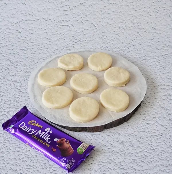 Mini Egg Nest Sugar Cookies with Dairy Milk And Gems-Place onto a lined baking tray and place in the refrigerator