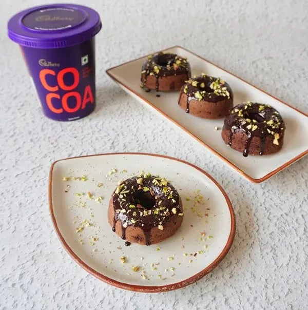 Mocha Donut with Crunchy Nuts & Pistachio - Garnish with chopped pistachios