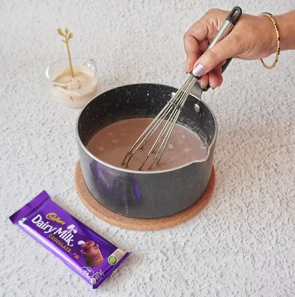 Mocha Hot Chocolate with Almonds & Dry Fruits - Stir in a touch of vanilla essence