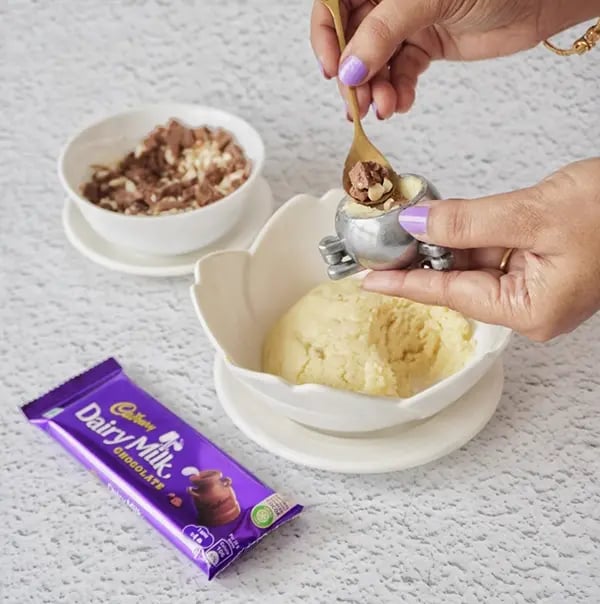 Modak with Dairy Milk Chocolate Filling- Place a small portion of the chocolate filling