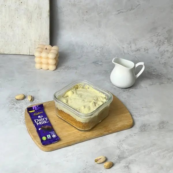 No-Bake Kunafa Dairymilk Cheesecake - Pouring Cheesecake Mixture