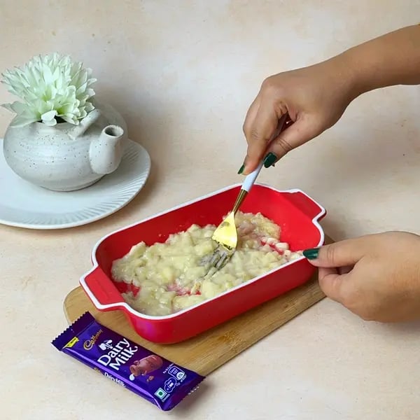 No-Fuss Banana Dairy Milk Chocolate Cake - Mashed Bananas In Bowl