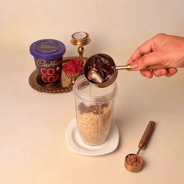 Oats Modak Recipe For Ganpati Bappa With Dry Fruits And Cadbury Cocoa Powder Twist - Adding Dates To Blender