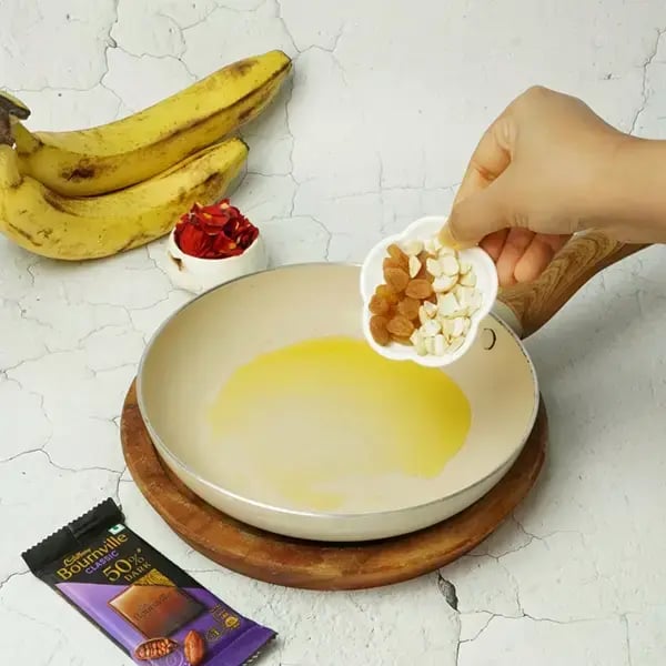 Onam Special Bournville Banana Halwa - Heat 3-4 tsp of ghee