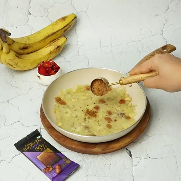 Onam Special Bournville Banana Halwa - Add in jaggery powder