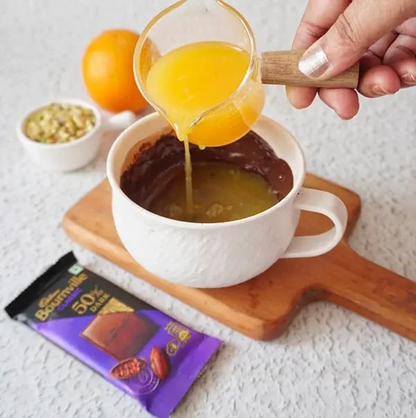 Orange Chocolate Mousse with Pistachio - Stir the freshly muddled orange juice