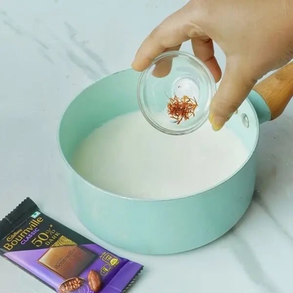 Oreo And Bournville Greek Yogurt Phirni-Pour milk into a thick bottomed pan