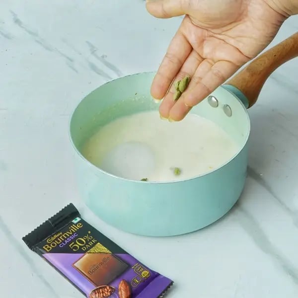 Oreo And Bournville Greek Yogurt Phirni-Now add cardamoms for extra flavor